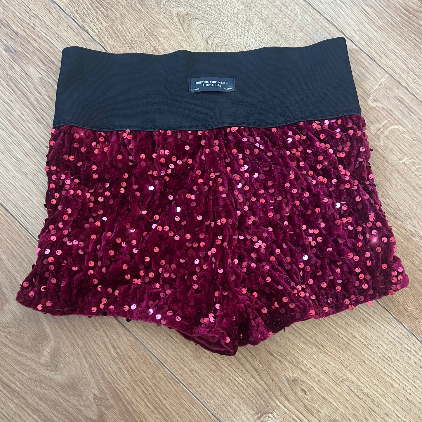 HIGH WAISTED SEQUIN SHORTS - WINE RED