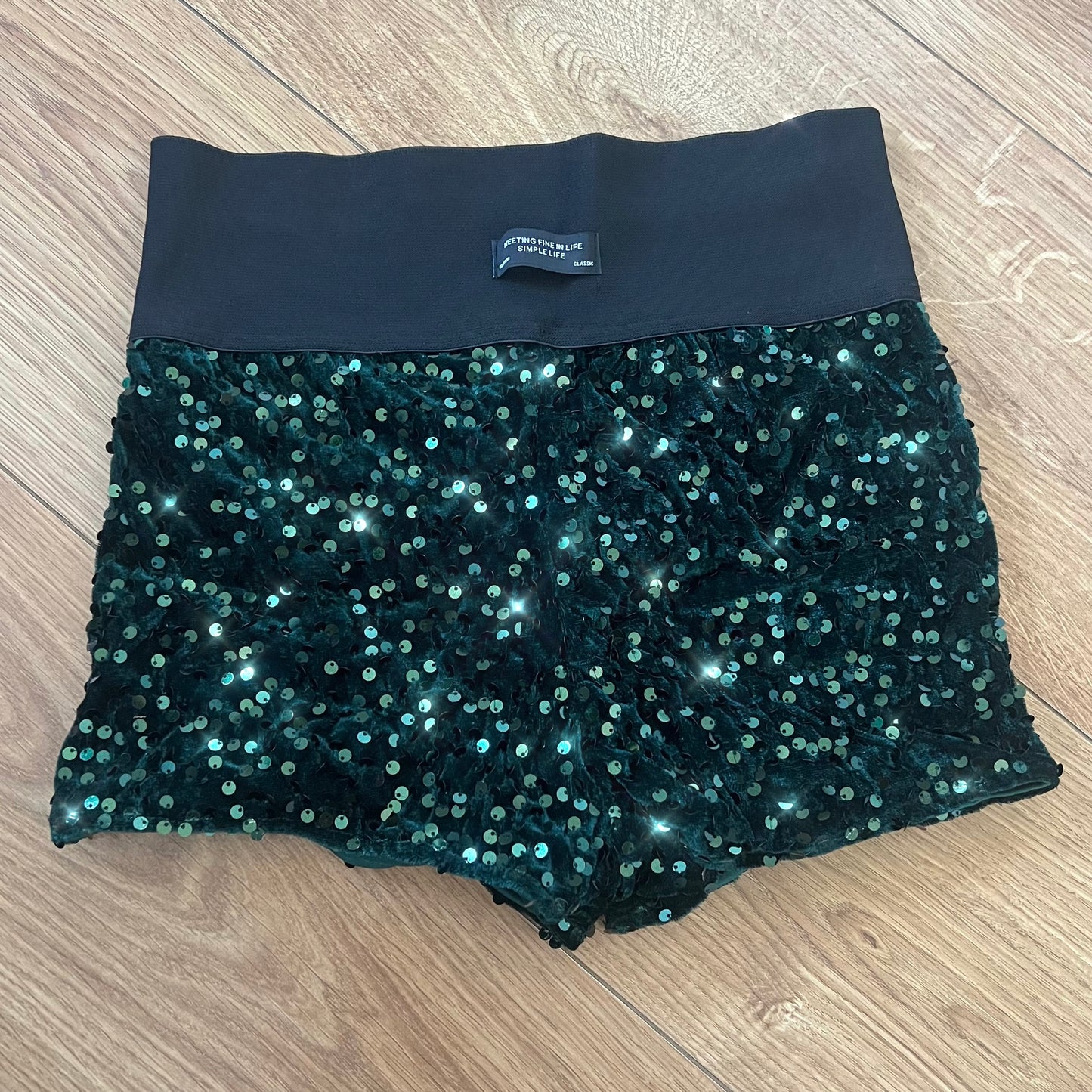 HIGH WAISTED SEQUIN SHORTS - BOTTLE GREEN